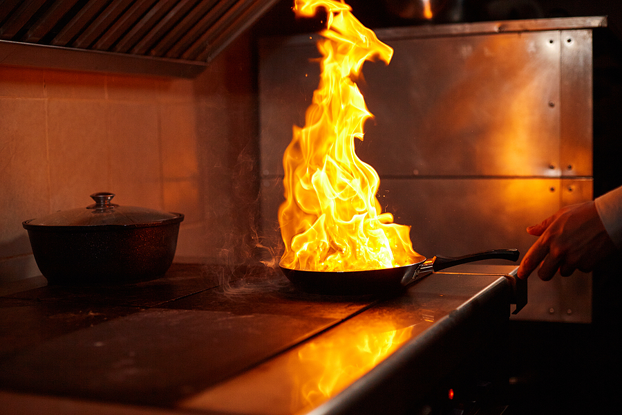 bigstock Flambe Fire In Frying Pan Pr 348086269ver3